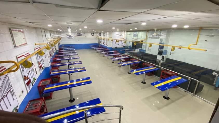 Ghaffar Honda Center servicing department showing lift lanes and dedicated tool stations